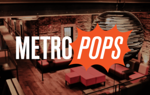 MetroPops Logo over homepage background picture