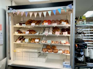 Shelves of donuts for sale at Fry Baby