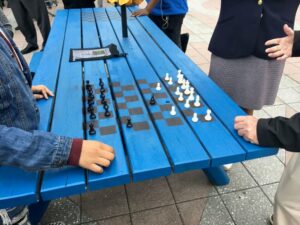 Picnic table painted with chess squares