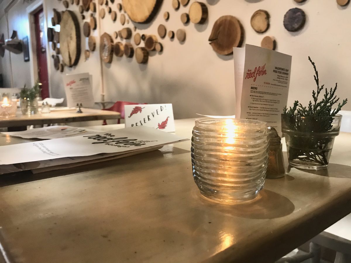 A candle lit table at Red Fern