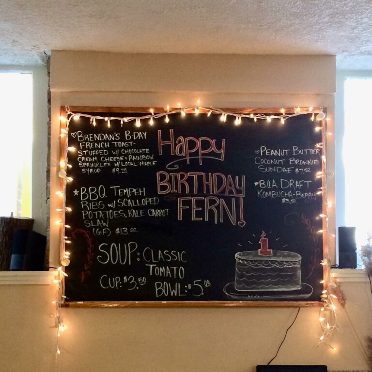 One Year birthday celebration, chalk board with specials listed