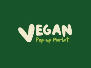Vegan Pop-up Market written on a dark green background